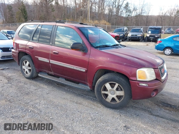 2004 GMC Envoy SLE with VIN 1GKDS13S342287315, listed as a IAAI auction lot 41486715 with 186,129 mi miles. Bid and sale history available at carsss.com. Image 1.