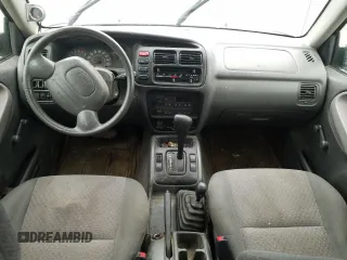 2003 Chevrolet Tracker z VIN 2CNBJ13C236901119, wystawiony jako Copart lot #68736774 z przebiegiem Nie podano mil oraz Szkoda całkowita • Salvage title. Historia ofert i sprzedaży dostępna na DreamBid. Obrazek 8.