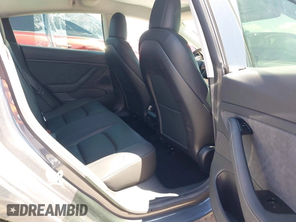2019 Tesla Model 3 Long Range with VIN 5YJ3E1EB9KF386047, listed as a IAAI auction lot 42215362 with 41,246 mi miles and . Bid and sale history available at DreamBid. Image 8.