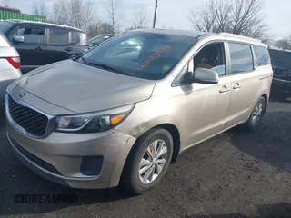 2015 Kia Sedona LX with VIN KNDMB5C15F6044093, listed as a IAAI auction lot 41843977 with 169,157 mi miles. Bid and sale history available at carsss.com. Image 2.