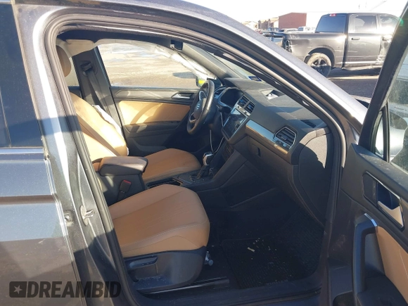 2022 Volkswagen Tiguan SE with VIN 3VV3B7AX1NM147445, listed as a IAAI auction lot 41755217 with 59,399 mi miles and . Bid and sale history available at DreamBid. Image 5.