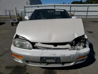 1996 Toyota Camry LE z VIN JT2BF12K3T0139807, wystawiony jako Copart lot #57675855 z przebiegiem 258 601 mil mil oraz Szkoda całkowita • Salvage title. Historia ofert i sprzedaży dostępna na DreamBid. Obrazek 5.