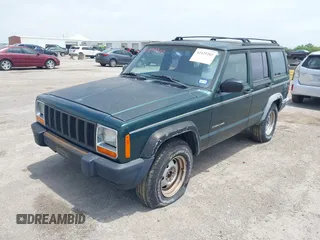 1999 Jeep Cherokee SE with VIN 1J4FT28S2XL669523, listed as a IAAI auction lot 42429202 with 83,250 mi miles and . Bid and sale history available at DreamBid. Image 2.
