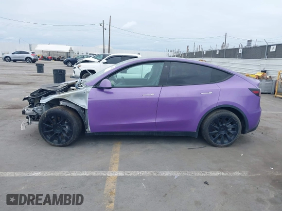 2021 Tesla Model Y Long Range with VIN 5YJYGDEE7MF224531, listed as a IAAI auction lot 38454442 with 52,408 mi miles. Bid and sale history available at carsss.com. Image 15.