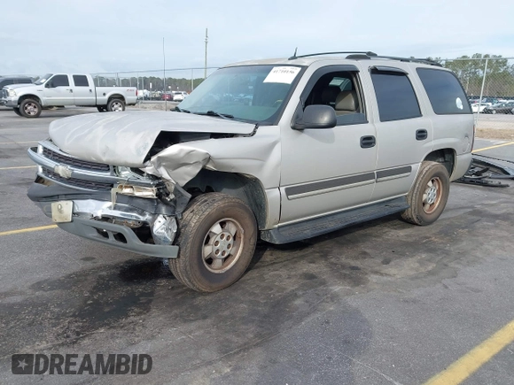 2004 Chevrolet Tahoe LT z VIN 1GNEC13Z34J258811, wystawiony jako IAAI lot #41710156 z przebiegiem 322 462 mil mil oraz . Historia ofert i sprzedaży dostępna na DreamBid. Obrazek 2.
