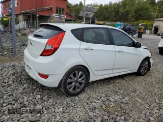 2015 Hyundai Accent Sport with VIN KMHCU5AEXFU220171, listed as a Copart auction lot 72114734 with 170,372 mi miles and Salvage Title. Bid and sale history available at carsss.com. Image 3.