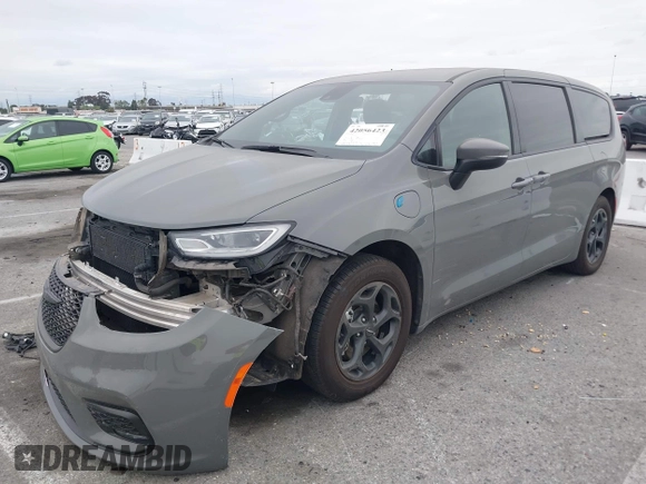 2023 Chrysler Pacifica Hybrid Touring L with VIN 2C4RC1L71PR584485, listed as a IAAI auction lot 42056423 with 58,955 mi miles and . Bid and sale history available at DreamBid. Image 20.