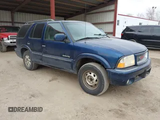 2000 GMC Jimmy SLE Convenience with VIN 1GKDT13W8Y2340743, listed as a IAAI auction lot 41393906 with 196,520 mi miles. Bid and sale history available at carsss.com. Image 1.