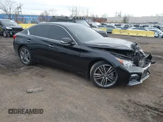 2015 Infiniti Q50 z VIN JN1BV7AR1FM411279, wystawiony jako IAAI lot #40991927 z przebiegiem 59 764 mil mil oraz . Historia ofert i sprzedaży dostępna na DreamBid. Obrazek 1.