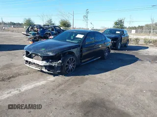 2018 BMW 5 Series M550i xDrive with VIN WBAJB9C57JG463933, listed as a IAAI auction lot 41295711 with 99,173 mi miles and . Bid and sale history available at carsss.com. Image 2.