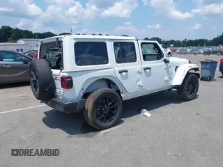 2024 Jeep Wrangler Sahara with VIN 1C4RJXP64RW270463, listed as a IAAI auction lot 42598295 with 36,251 mi miles and . Bid and sale history available at DreamBid. Image 4.