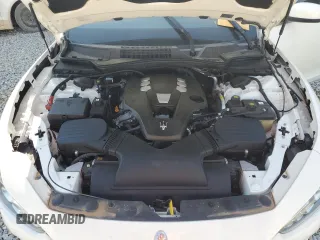 2014 Maserati Ghibli z VIN ZAM57XSA5E1081980, wystawiony jako Copart lot #53546905 z przebiegiem 60 019 mil mil oraz Tytuł czysty. Historia ofert i sprzedaży dostępna na DreamBid. Obrazek 11.