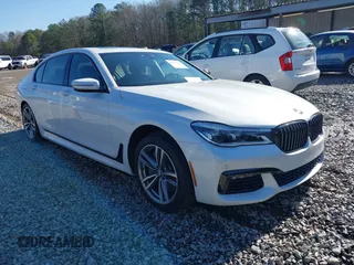 2017 BMW 7 Series 750i with VIN WBA7F0C34HGM21738, listed as a IAAI auction lot 41772933 with 62,923 mi miles. Bid and sale history available at carsss.com. Image 1.