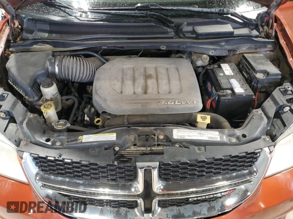 2012 Dodge Grand Caravan SE with VIN 2C4RDGBG5CR302148, listed as a Copart auction lot 54129475 with 191,187 mi miles and Clean Title. Bid and sale history available at DreamBid. Image 12.