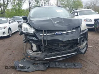 2013 Ford Escape SE with VIN 1FMCU0GX6DUC98598, listed as a IAAI auction lot 42133641 with 174,111 mi miles and . Bid and sale history available at DreamBid. Image 6.