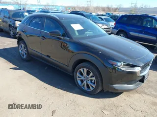 2024 Mazda CX-30 S Carbon Edition with VIN 3MVDMBCM4RM607530, listed as a IAAI auction lot 41796426 with 3,715 mi miles and . Bid and sale history available at DreamBid. Image 1.
