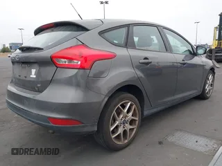 2015 Ford Focus SE with VIN 1FADP3K27FL387012, listed as a IAAI auction lot 42100945 with 85,588 mi miles. Bid and sale history available at carsss.com. Image 4.