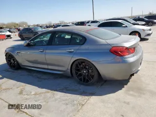 2015 BMW M6 z VIN WBS6C9C56FD467608, wystawiony jako Copart lot #49823385 z przebiegiem 67 748 mil mil oraz Czysty tytuł • Clean title. Historia ofert i sprzedaży dostępna na DreamBid. Obrazek 2.