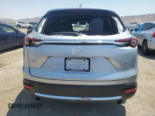 2021 Mazda CX-9 Grand Touring z VIN JM3TCADY4M0512268, wystawiony jako Copart lot #62683464 z przebiegiem Nie podano mil oraz Szkoda całkowita • Salvage title. Historia ofert i sprzedaży dostępna na DreamBid. Obrazek 6.