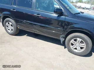 2005 Honda Pilot EX-L with RES with VIN 5FNYF18665B023730, listed as a IAAI auction lot 41989012 with 202,022 mi miles. Bid and sale history available at carsss.com. Image 6.