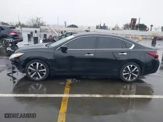 2018 Nissan Altima 2.5 SV with VIN 1N4AL3AP9JC117719, listed as a IAAI auction lot 41720521 with 103,541 mi miles. Bid and sale history available at carsss.com. Image 15.
