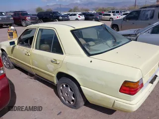 1987 Mercedes-Benz 300 with VIN WDBEA30DXHA466708, listed as a IAAI auction lot 41518078 with 166,202 mi miles. Bid and sale history available at carsss.com. Image 3.