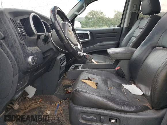 2006 Honda Ridgeline RTL z VIN 2HJYK16546H544183, wystawiony jako Copart lot #57426655 z przebiegiem 162 878 mil mil oraz Szkoda całkowita • Salvage title. Historia ofert i sprzedaży dostępna na DreamBid. Obrazek 7.