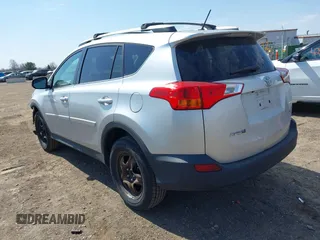 2014 Toyota RAV4 LE with VIN 2T3BFREV4EW136537, listed as a IAAI auction lot 42065728 with 211,039 mi miles and . Bid and sale history available at DreamBid. Image 3.