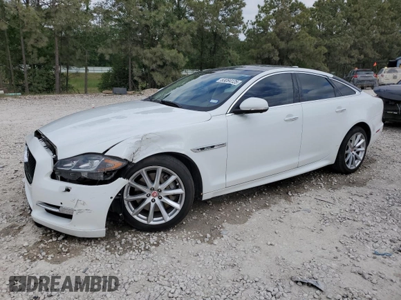 2016 Jaguar XJ R-Sport z VIN SAJWA1C71G8V92642, wystawiony jako Copart lot #53094125 z przebiegiem 98 548 mil mil oraz Szkoda całkowita • Salvage title. Historia ofert i sprzedaży dostępna na DreamBid. Obrazek 1.
