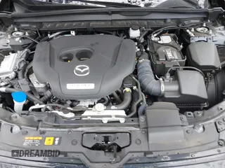 2024 Mazda CX-50 Premium z VIN 7MMVABDYXRN180263, wystawiony jako IAAI lot #41738791 z przebiegiem 9 688 mil mil oraz . Historia ofert i sprzedaży dostępna na DreamBid. Obrazek 10.
