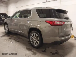 2018 Chevrolet Traverse Premier with VIN 1GNEVJKW0JJ165144, listed as a IAAI auction lot 41129951 with 137,593 mi miles. Bid and sale history available at carsss.com. Image 3.