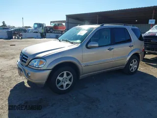 2002 Mercedes-Benz M 320/430/500 with VIN 4JGAB75E42A322824, listed as a IAAI auction lot 41871249 with 203,845 mi miles and . Bid and sale history available at carsss.com. Image 17.