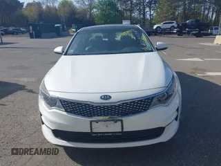 2016 Kia Optima EX with VIN 5XXGU4L32GG070138, listed as a IAAI auction lot 42138810 with 131,040 mi miles. Bid and sale history available at carsss.com. Image 12.