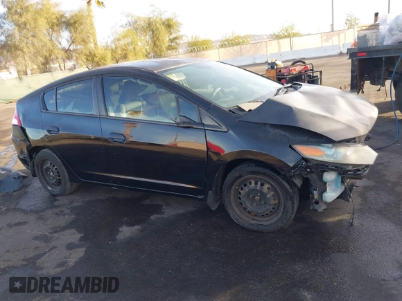 2010 Honda Insight LX with VIN JHMZE2H59AS006887, listed as a IAAI auction lot 41159288 with 263,497 mi miles and . Bid and sale history available at DreamBid. Image 13.