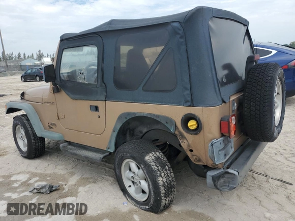 1999 Jeep Wrangler SE with VIN 1J4FY29P2XP451036, listed as a Copart auction lot 50551755 with 0 mi miles and Salvage Title. Bid and sale history available at carsss.com. Image 2.