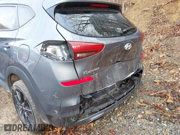 2019 Hyundai Tucson Ultimate with VIN KM8J3CAL0KU020133, listed as a IAAI auction lot 41856333 with 93,772 mi miles. Bid and sale history available at carsss.com. Image 12.