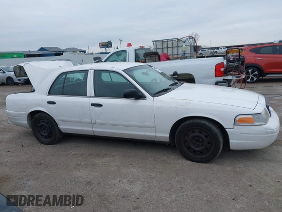 2006 Ford Police Interceptor z VIN 2FAFP71W96X150559, wystawiony jako IAAI lot #41590316 z przebiegiem 127 728 mil mil oraz . Historia ofert i sprzedaży dostępna na DreamBid. Obrazek 13.