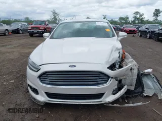 2016 Ford Fusion Titanium with VIN 3FA6P0SU5GR287017, listed as a IAAI auction lot 42316622 with 97,000 mi miles and . Bid and sale history available at DreamBid. Image 12.