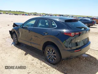 2023 Mazda CX-30 S with VIN 3MVDMBAM8PM548451, listed as a IAAI auction lot 41972170 with 36,379 mi miles and . Bid and sale history available at carsss.com. Image 3.