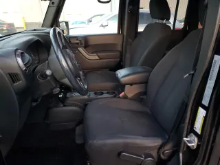2018 Jeep Wrangler JK Unlimited Sport S with VIN 1C4HJWDG3JL938178, listed as a Copart auction lot 82304604 with 80,302 mi miles and Salvage Title. Bid and sale history available at carsss.com. Image 7.