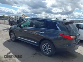 2013 Infiniti JX35 z VIN 5N1AL0MM0DC302090, wystawiony jako IAAI lot #41945285 z przebiegiem 198 767 mil mil oraz . Historia ofert i sprzedaży dostępna na DreamBid. Obrazek 3.
