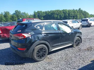 2017 Hyundai Tucson SE with VIN KM8J3CA41HU403662, listed as a IAAI auction lot 39867347 with 151,980 mi miles. Bid and sale history available at carsss.com. Image 4.
