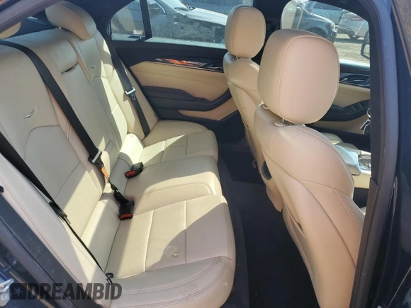 2019 Cadillac CTS Luxury AWD z VIN 1G6AX5SS1K0101825, wystawiony jako Copart lot #52970115 z przebiegiem 56 886 mil mil oraz Czysty tytuł • Clean title. Historia ofert i sprzedaży dostępna na DreamBid. Obrazek 10.