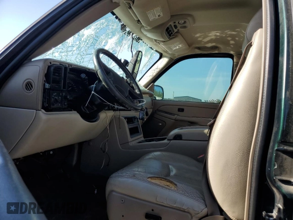 2004 Chevrolet Tahoe LS z VIN 1GNEC13Z24R174609, wystawiony jako Copart lot #52234105 z przebiegiem 182 306 mil mil oraz Szkoda całkowita • Salvage title. Historia ofert i sprzedaży dostępna na DreamBid. Obrazek 7.