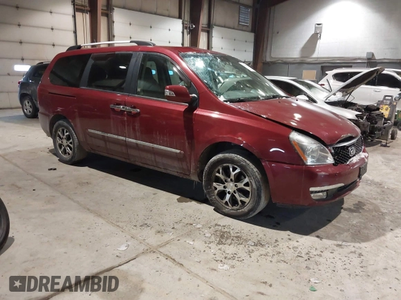 2014 Kia Sedona EX with VIN KNDMH4C74E6547870, listed as a IAAI auction lot 41403040 with 156,005 mi miles. Bid and sale history available at carsss.com. Image 1.