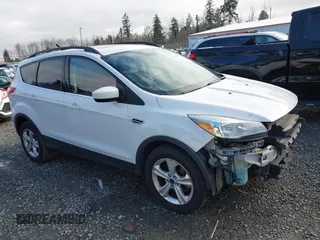 2016 Ford Escape SE z VIN 1FMCU9G96GUC15858, wystawiony jako IAAI lot #41799156 z przebiegiem 162 033 mil mil oraz . Historia ofert i sprzedaży dostępna na DreamBid. Obrazek 14.