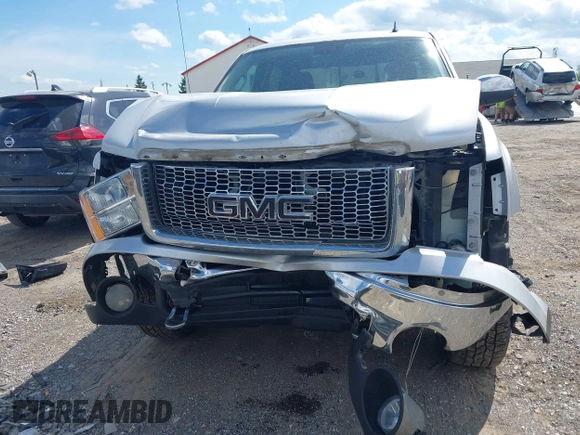 2012 GMC Sierra 1500 SLE z VIN 3GTP2VE71CG159590, wystawiony jako IAAI lot #42291489 z przebiegiem 167 528 mil mil oraz . Historia ofert i sprzedaży dostępna na DreamBid. Obrazek 6.