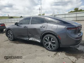 2024 Toyota Crown XLE with VIN JTDAAAAF7R3022194, listed as a Copart auction lot 54059125 with 22,977 mi miles and Salvage Title. Bid and sale history available at DreamBid. Image 2.