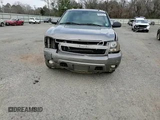 2007 Chevrolet Suburban LT z VIN 1GNFK163X7R411642, wystawiony jako Copart lot #48594595 z przebiegiem 233 733 mil mil oraz Szkoda całkowita • Salvage title. Historia ofert i sprzedaży dostępna na DreamBid. Obrazek 12.