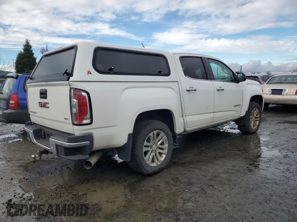2016 GMC Canyon 4WD SLT with VIN 1GTP6DE11G1266217, listed as a Copart auction lot 82195694 with 129,578 mi miles and Clean Title. Bid and sale history available at carsss.com. Image 3.